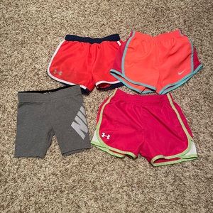 Girls short lots size 6/6x two Under Armour and two Nike